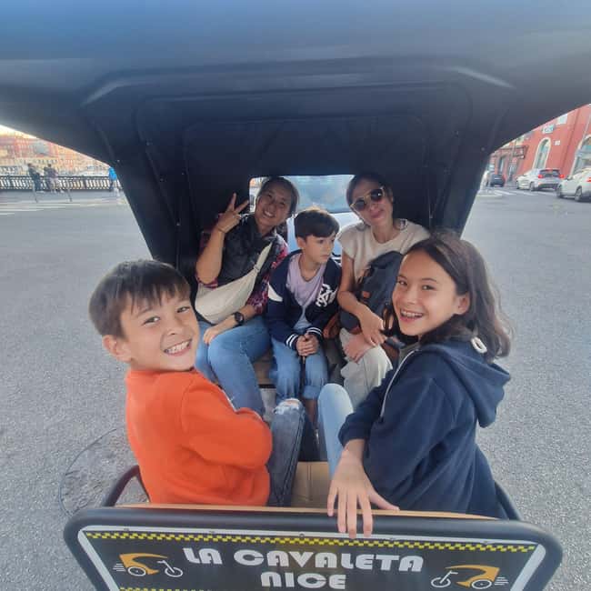 Nice: Family city tour by bicycle Electric cab (4 comfort seats) - Guide voice, languages, and what you will actually learn