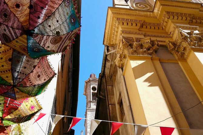 Nice Small-Group Old Town & Castle Hill Cultural Walking Tour with a Local Guide - Garibaldi Square: painted façade, Turin links, and a big personality