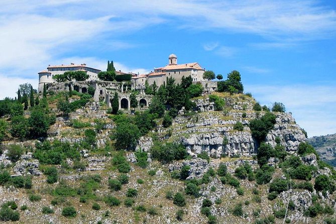 Private Full-Day Tour on the French Riviera from Nice - Antibes: coastal road views and Old Town ramparts
