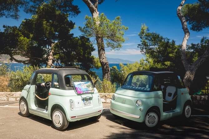 Retro Electric Topolino Ride on the French Riviera - Saint-Jean-Cap-Ferrat viewpoint: sea, greenery, and blue water