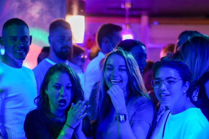 Riviera Bar Crawl Party with Free Shots and VIP Entry - Entering Nice at night, with a built-in party rhythm