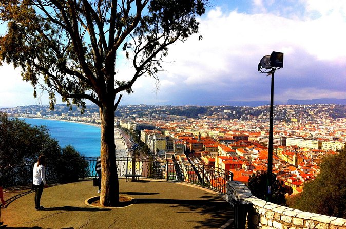 The Essentials of Nice 3h E-Bike Tour - Place Île-de-Beaute, harbor scenes and ferry stories